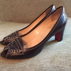 Christian Louboutin chocolate leather heals.